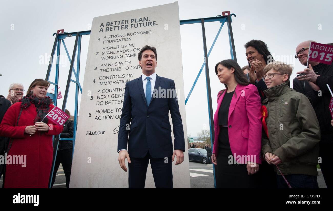 Labour leader Ed Miliband unveils Labour's pledges carved into a stone plinth in Hastings during General Election campaigning. Stock Photo