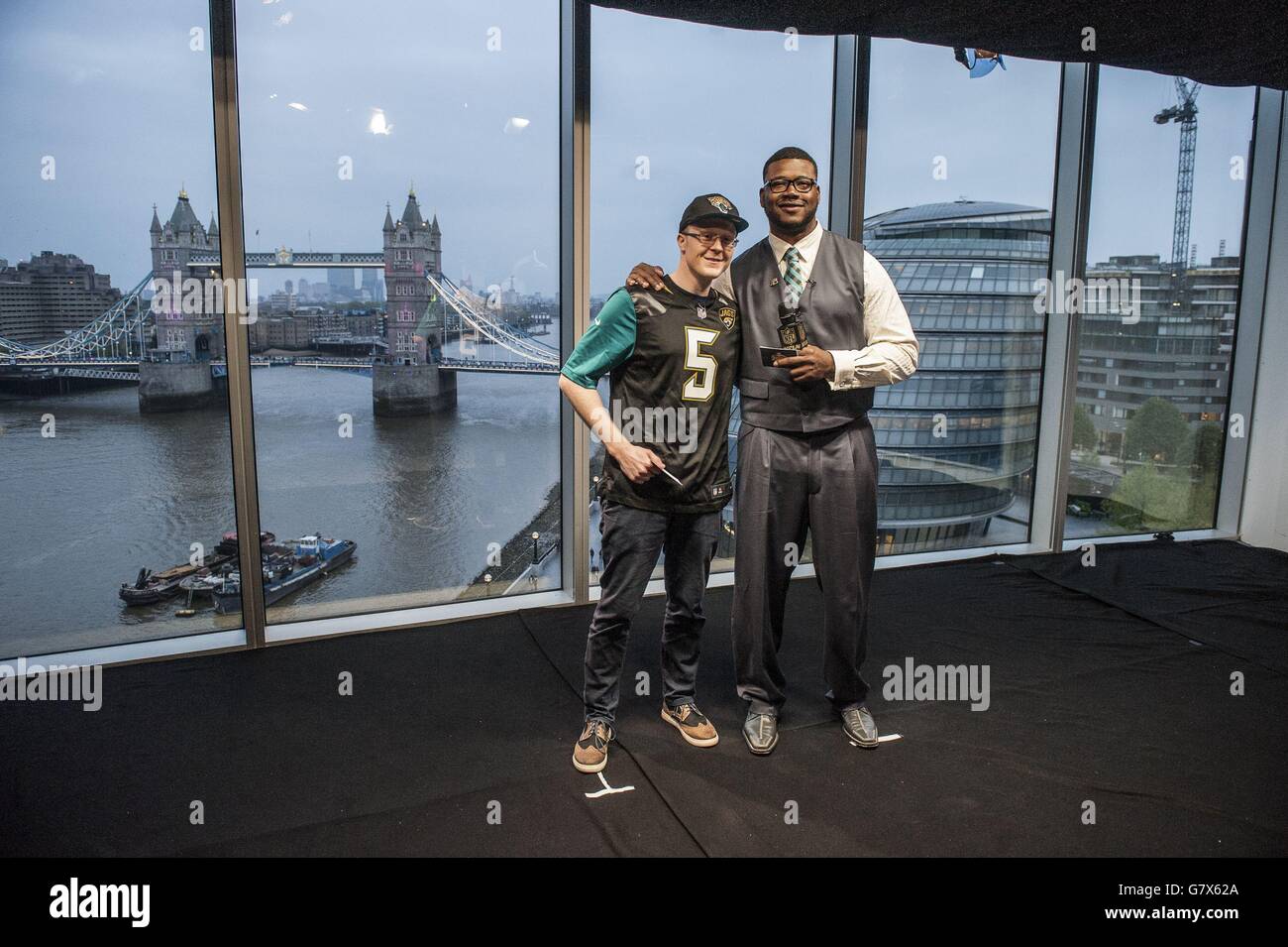 Jacksonville Jaguars fan George Bedford with staff behind the