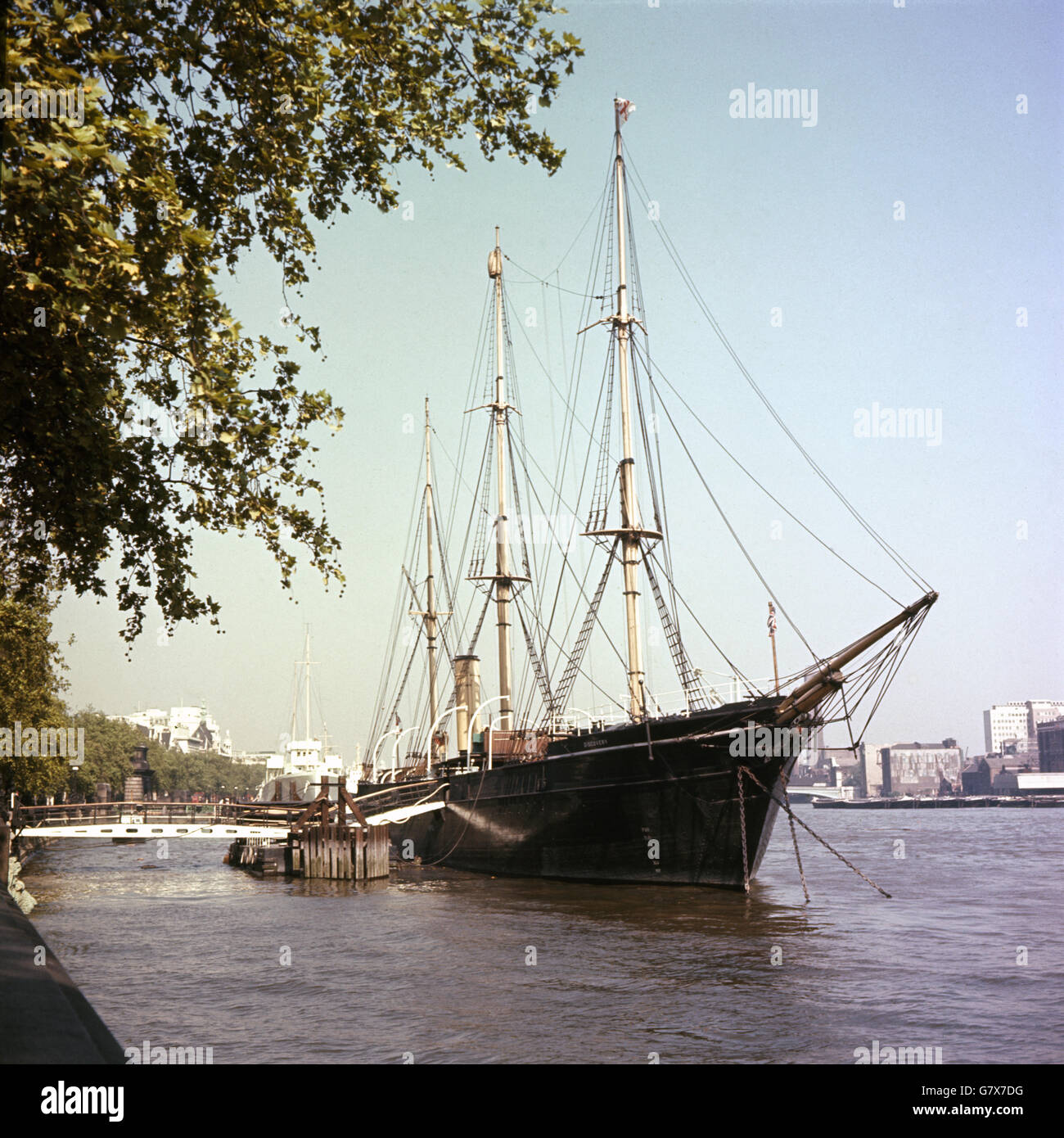 HMS Discovery pictured on the Thames in London where she is used as a drill ship for the Royal Navy Auxiliary Reserve and also training ship for the Westminster Sea Cadet Corps. RRS Discovery was the last traditional wooden three-masted ship to be built in Britain. Designed for Antarctic research, she was launched as a Royal Research Ship (RRS) in 1901. Her first mission was the British National Antarctic Expedition, carrying Robert Falcon Scott and Ernest Shackleton on their first, successful journey to the Antarctic, known as the Discovery Expedition. Stock Photo