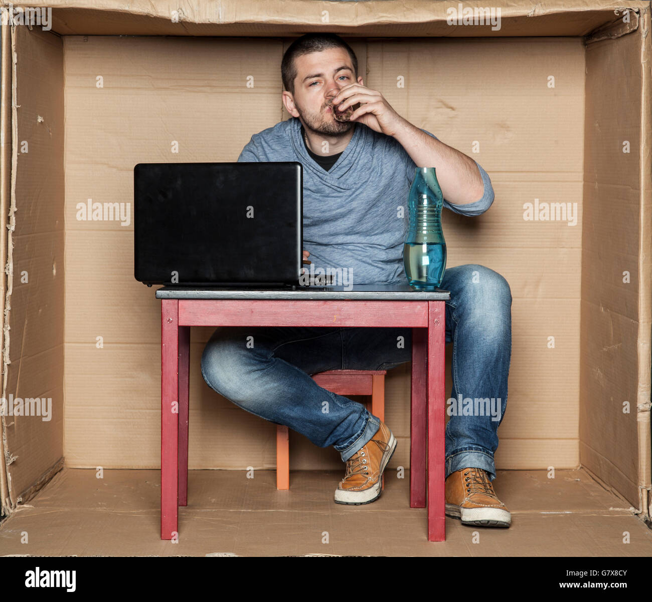 Handsome young man glass hi-res stock photography and images - Alamy