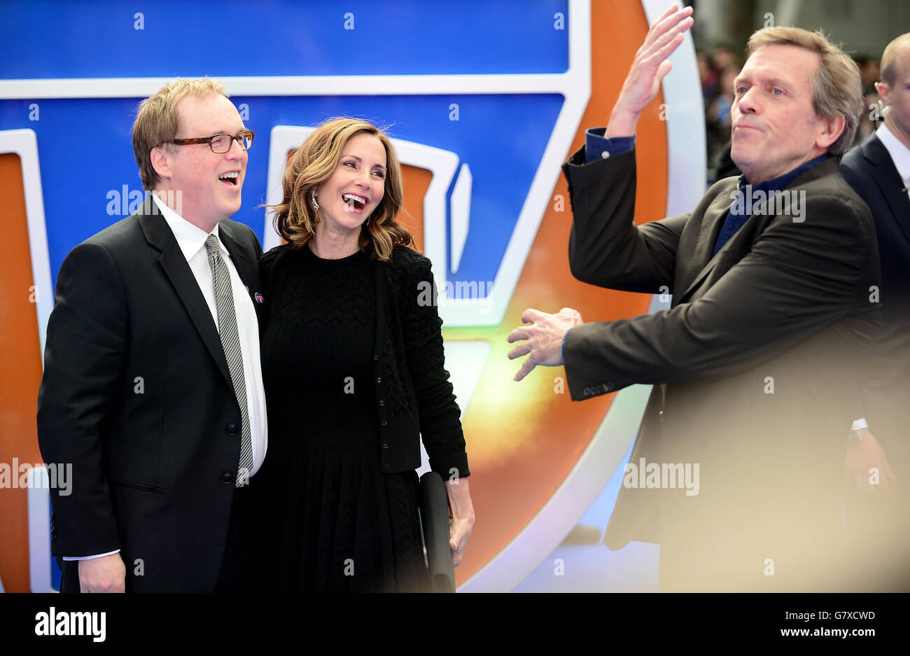 Brad bird beside wife elizabeth hugh laurie attending premiere