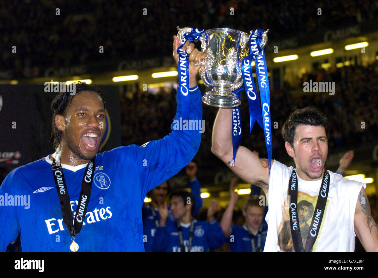 Chelsea's Didier Drogba and Mateja Kezman celebrate with the trophy Stock Photo
