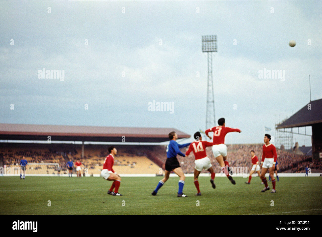 Soccer - World Cup England 1966 - Group Four - Italy v North Korea - Ayresome Park. North Korea's Shin Yung Kyoo (second r) heads clear, watched by teammate Ha Jung Won (c) Stock Photo