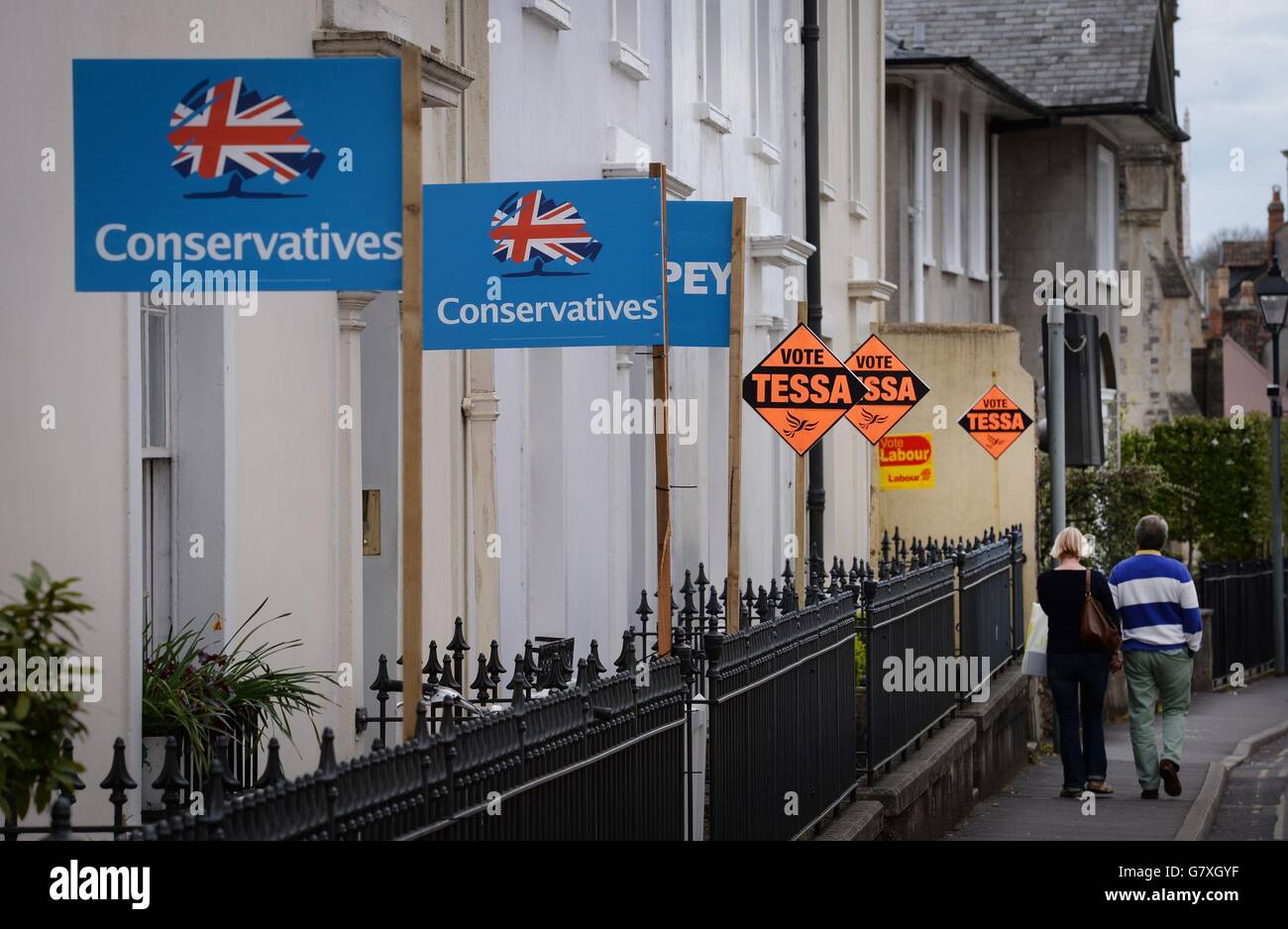 Political party campaign boards outside houses in Wells, Somerset, with only three days before polling day for this year's General Election. Stock Photo