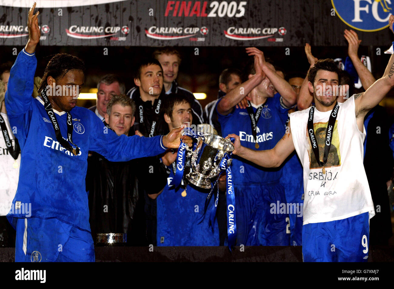 Soccer - Carling Cup - Final - Chelsea v Liverpool - Millennium Stadium. Chelsea goalscorers Didier Drogba and Mateja Kezman (r) celebrate with the trophy Stock Photo
