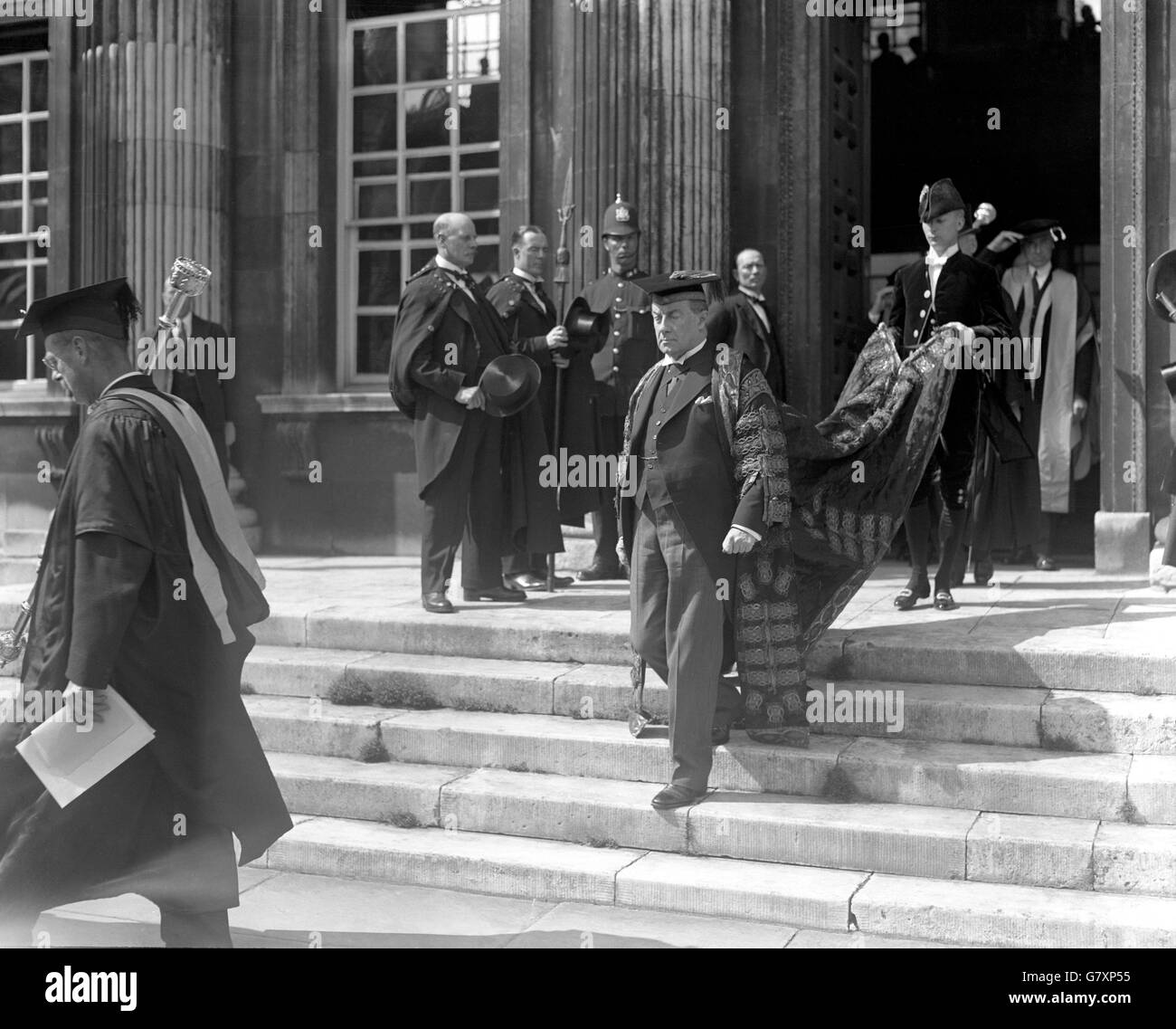 Stanley Baldwin, Chancellor of Cambridge University, leaves the Senate House. Stock Photo