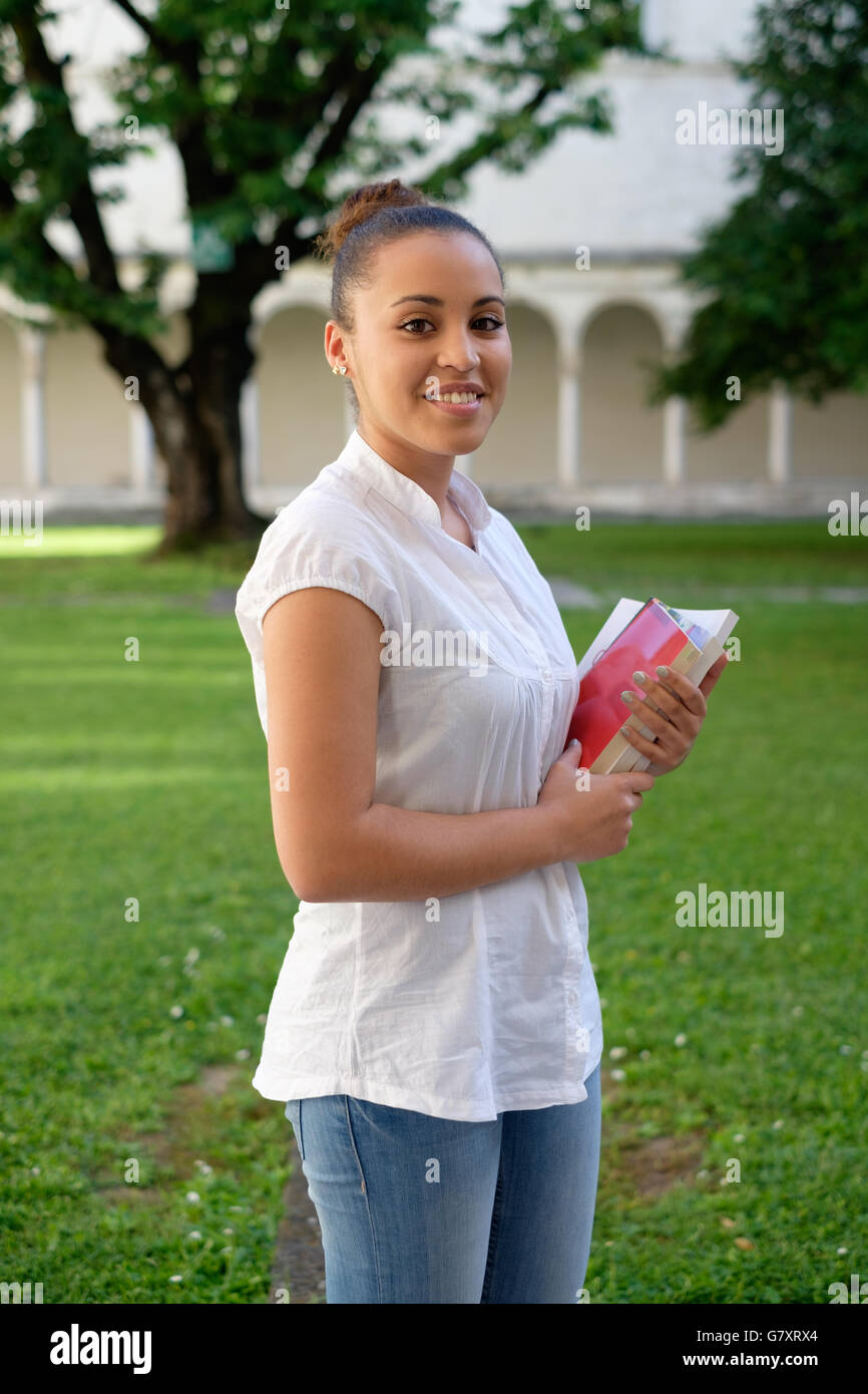 Black student portrait books hi-res stock photography and images - Alamy