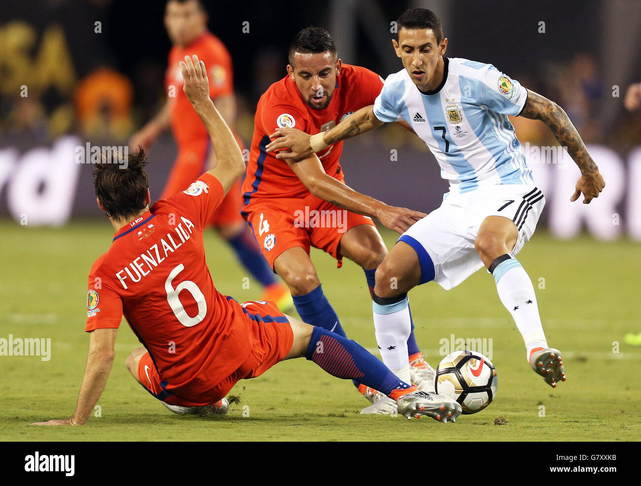 New Jersey, USA. 26th June, 2016. Jos¨¦ Pedro Fuenzalida (L) of Chile vies with ?ngel Di Mar¨ªa (R) of Argentina during the 2016 Copa America Centenario soccer tournament Final at the Metlife Stadium in New Jersey, the United States on June 26, 2016. Chile defeated Argentina with 4-2 in penalty shootout. Credit:  Qin Lang/Xinhua/Alamy Live News Stock Photo