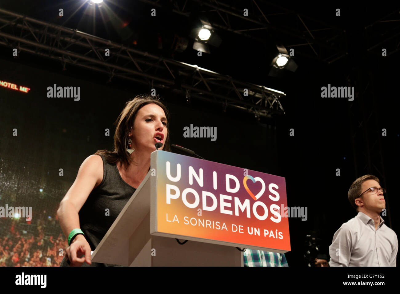 Madrid, Spain. 27th Jun, 2016. Irene Montero of the Spanish anti-austerity party Podemos (We Can) tries to cheer up their supporters on the election night in Madrid after the coalition of left-wing parties Unidos Podemos (Together We Can) failed to achieve expected results in the repeated general election on 26 June 2016. Credit:  Mira Galanova/Alamy Live News Stock Photo