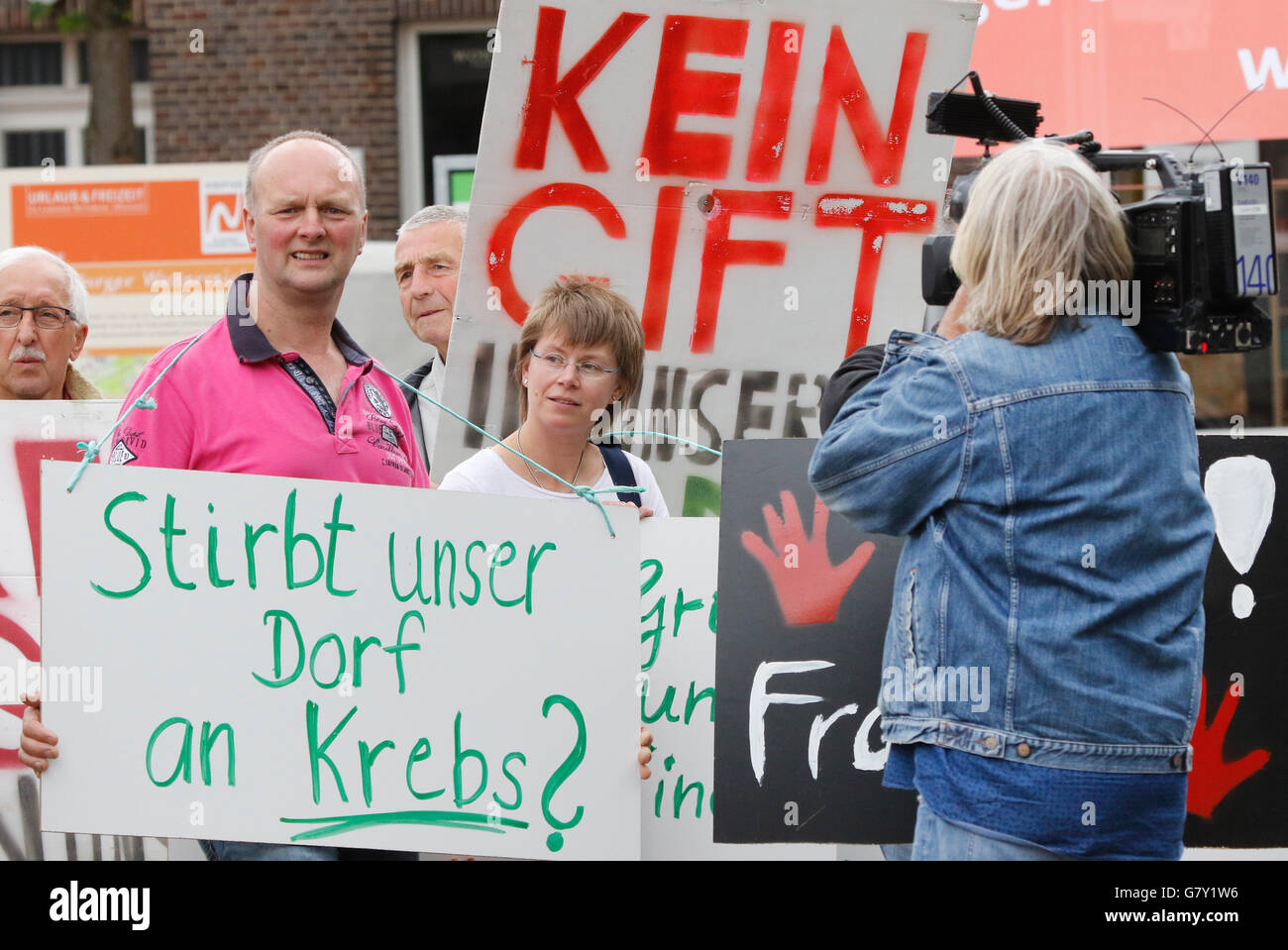 Opponents of fracking demonstrating with banners in front of the town hall, in Rotenburg an der Wuemme, Germany, 27 June 2017. PHOTO: FOCKE STRANGMANN/DPA Stock Photo