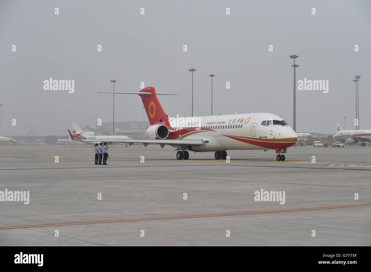 Chengdu, China's Sichuan Province. 28th June, 2016. Chengdu Airlines ARJ21-700 prepares for takeoff at Shuangliu International Airport in Chengdu, capital of southwest China's Sichuan Province, June 28, 2016. ARJ21, manufactured by the Commercial Aircraft Corp. of China (COMAC), made its maiden commercial flight from Chengdu to Shanghai Tuesday. The domestically-designed airliner is China's first regional jet manufactured according to international standards. © Liu Kun/Xinhua/Alamy Live News Stock Photo