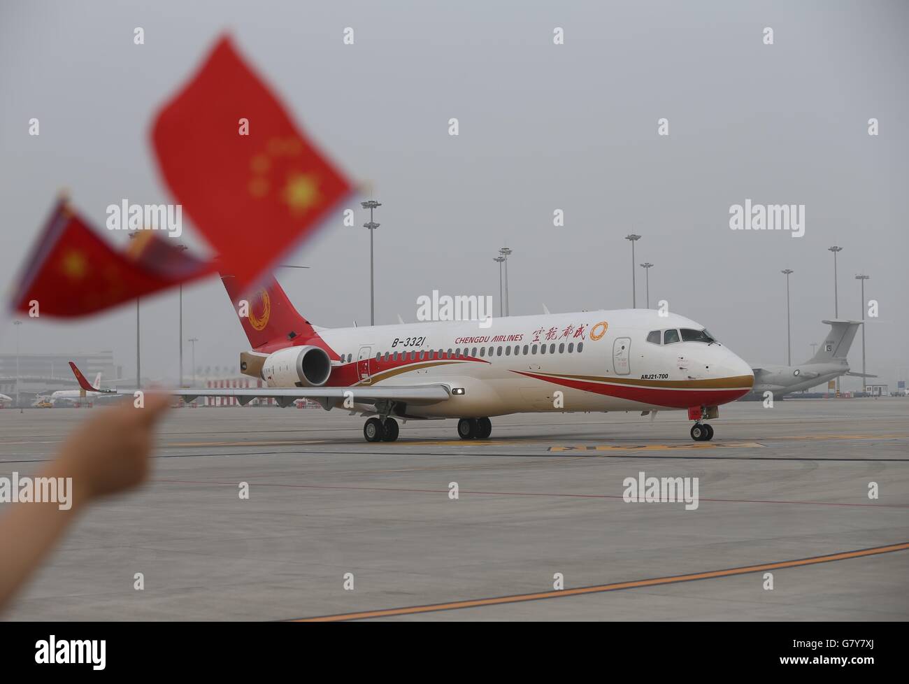 Chengdu, China's Sichuan Province. 28th June, 2016. Chengdu Airlines ARJ21-700 prepares for takeoff at Shuangliu International Airport in Chengdu, capital of southwest China's Sichuan Province, June 28, 2016. ARJ21, manufactured by the Commercial Aircraft Corp. of China (COMAC), made its maiden commercial flight from Chengdu to Shanghai Tuesday. The domestically-designed airliner is China's first regional jet manufactured according to international standards. © Ding Ting/Xinhua/Alamy Live News Stock Photo