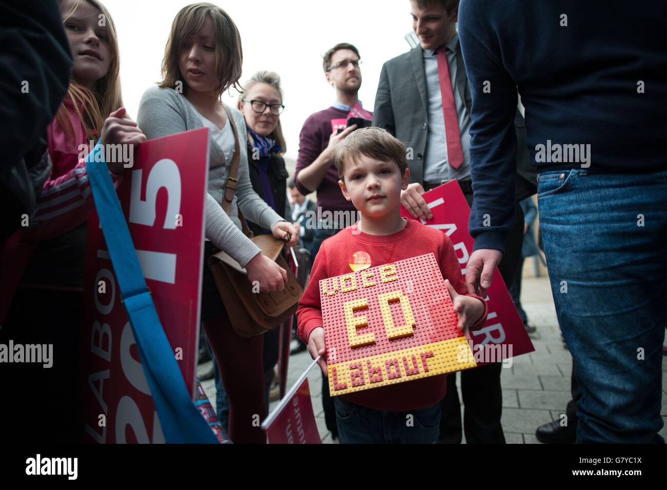 Four-year-old Dudley Idle from Maidstone shows his support for Labour leader Ed Miliband at Sussex Coast College in Hastings, where he watched the opposition leader address Labour supporters. Stock Photo