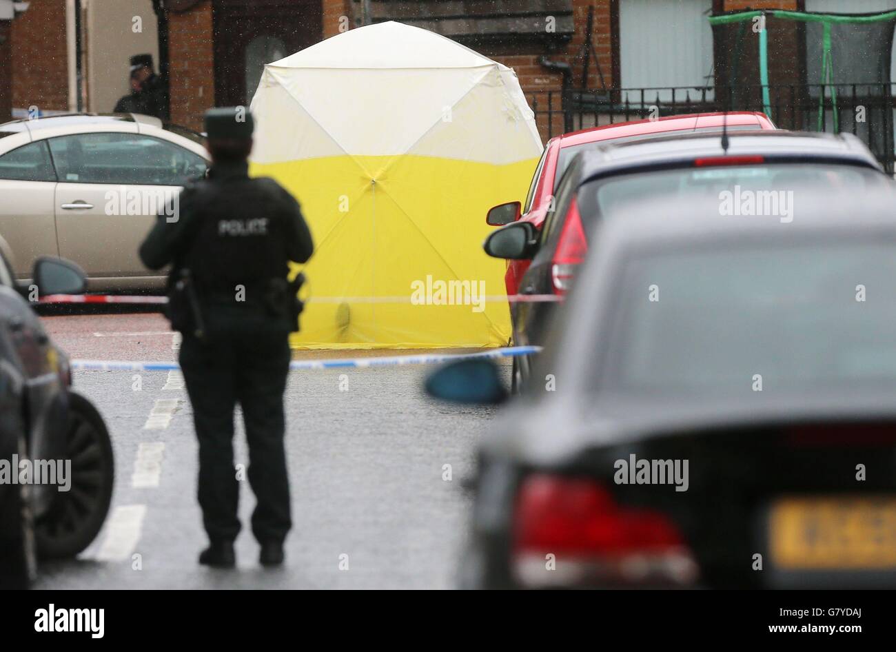 Police in Welsh Street, in the Markets area near Belfast city centre following the fatal shooting of Gerard 'Jock' Davison, a former IRA commander. Stock Photo