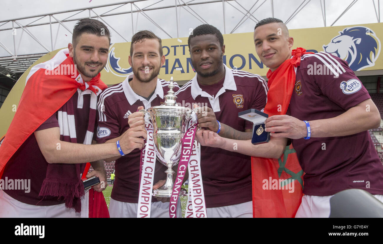 (left tot right) Heart of Midlothian Alim Ozturk, Miguel Pallardo, Gienero Zefuik and Soufian El Hassnaoui celebrate with the Scottish Championship trophy. Stock Photo