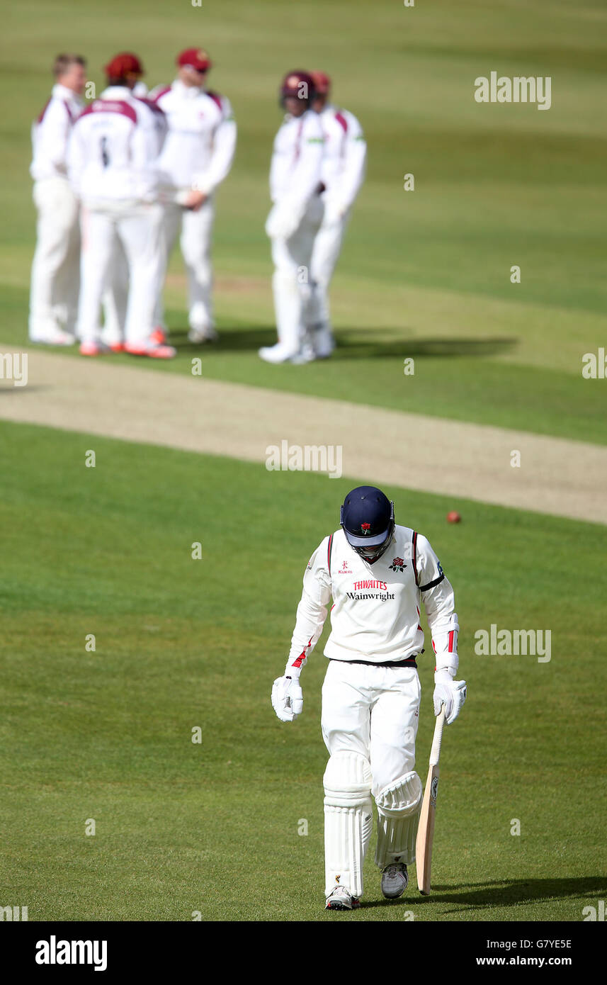 Lancashire's Tom Bailey leaves the pitch after being dismissed by Northamptonshire's Josh Cobb (not pictured) during the LV County Championship, Division Two match at The County Ground, Northamptonshire. Stock Photo