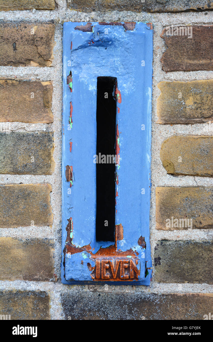 Close up of old blue mailbox in a bricks wall Stock Photo Alamy