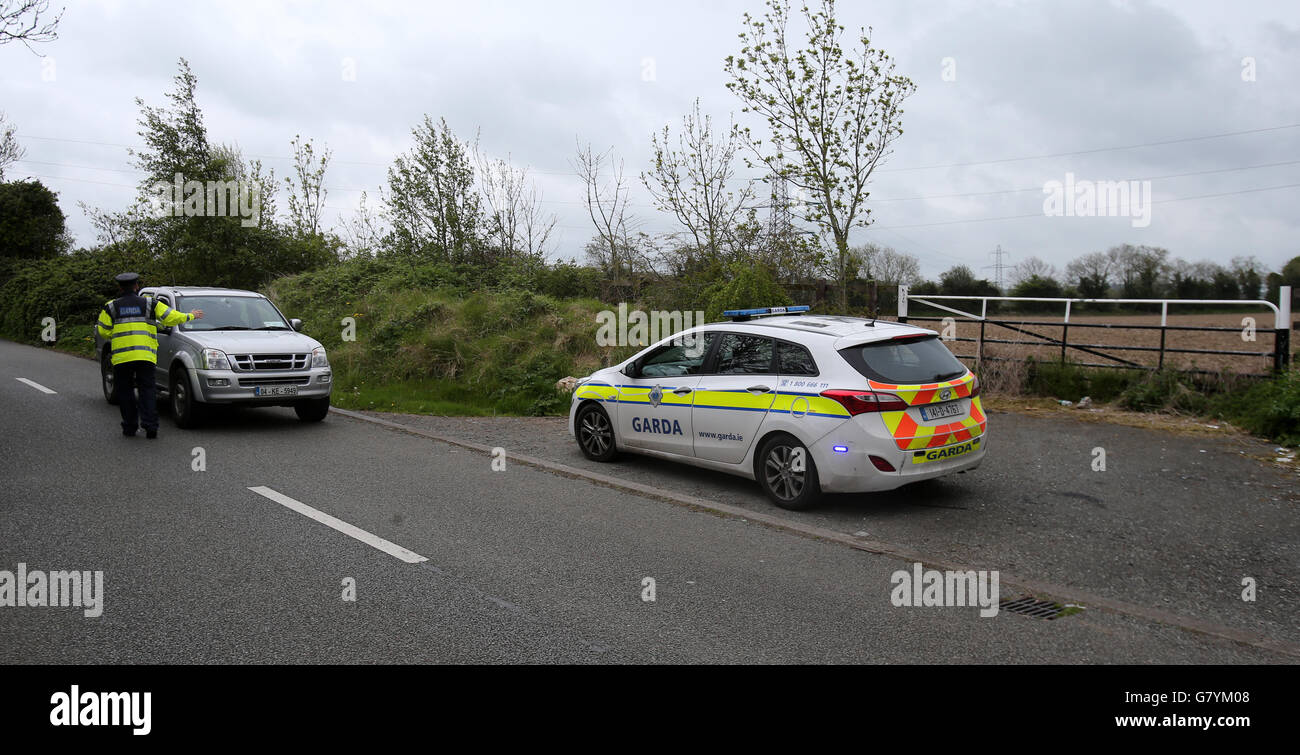 Gardai investigating the case of a baby abandoned on Steelstown Road in Rathcoole, Co Dublin, last Friday, question drivers at the scene as they issued a fresh appeal for information to try to identify the baby and her parents. Stock Photo