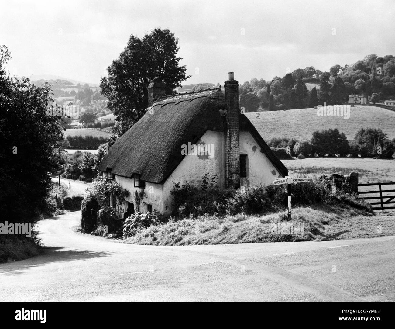 Lustleigh, Devonshire. A thatched cottage in Lustleigh, Devonshire. Stock Photo