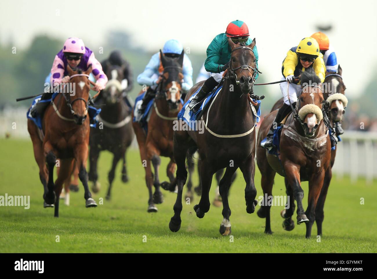Indescribable ridden by Silvestre De Sousa (centre) wins The Ralph Raper Memorial Stakes during day three of the Dante Festival at York Racecourse, York. Stock Photo