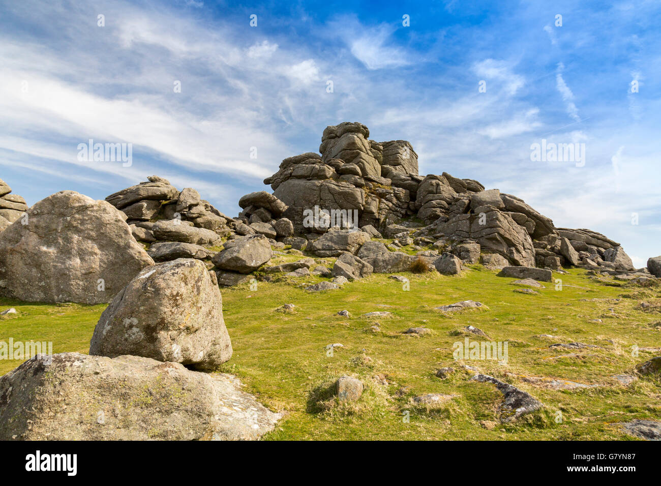 The granite of Hound Tor has been weathered by millions of years of wind, rain and frost on Dartmoor, Devon, England, UK Stock Photo