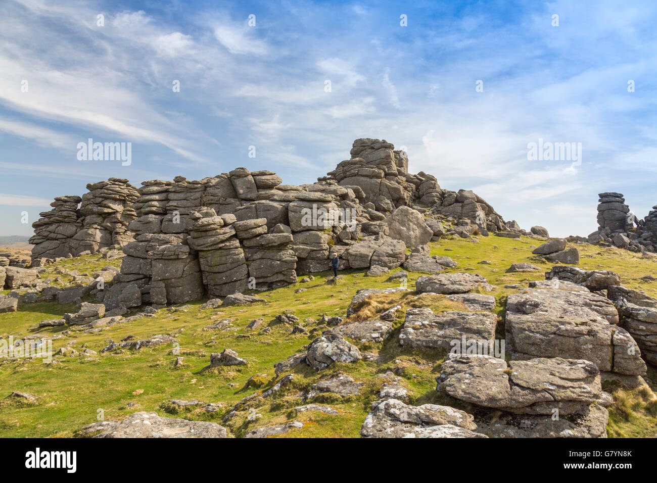 The granite of Hound Tor has been weathered by millions of years of wind, rain and frost on Dartmoor, Devon, England, UK Stock Photo