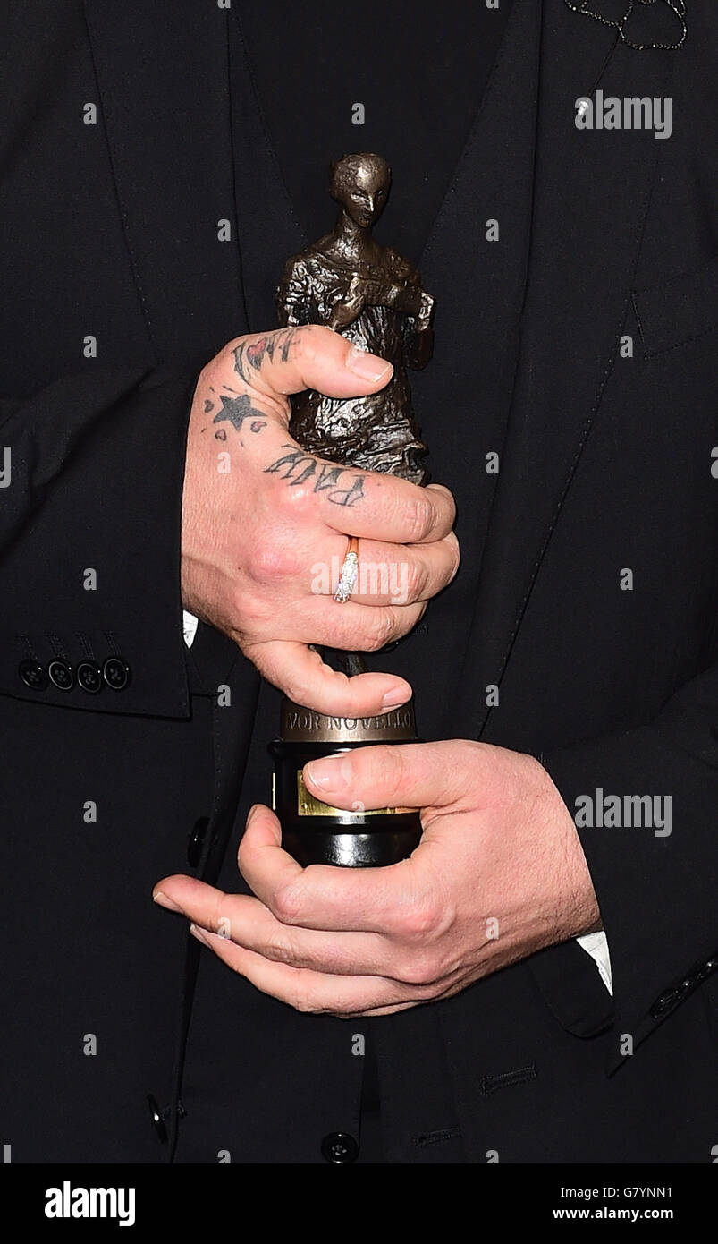 Boy George wins the PRS outstanding contribution to British music award, at the 60th annual Ivor Novello Awards, at Grosvenor House in London. Stock Photo