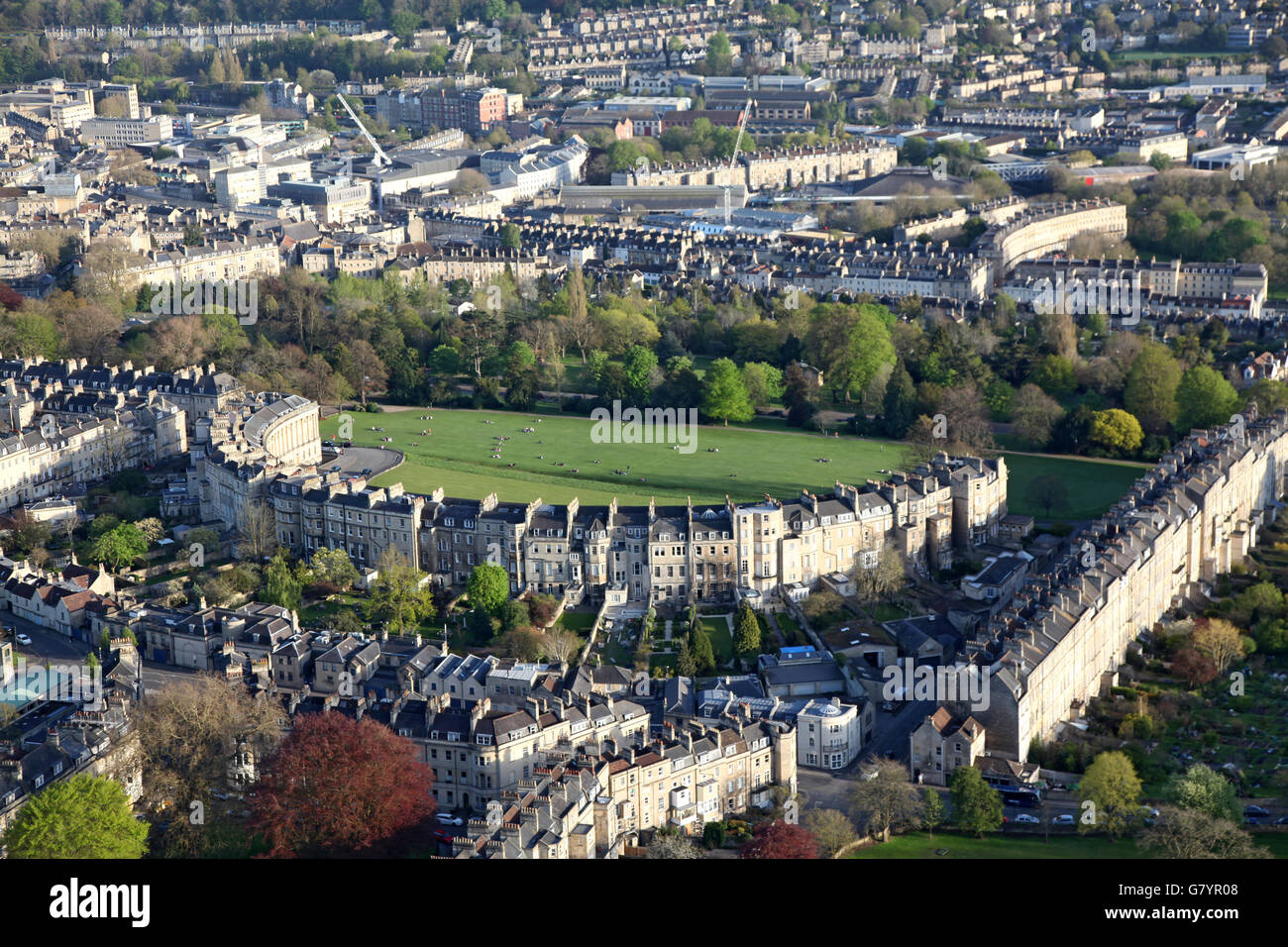 Looking down on the Royal crescent Bath with some of bath City shown in the background Stock Photo