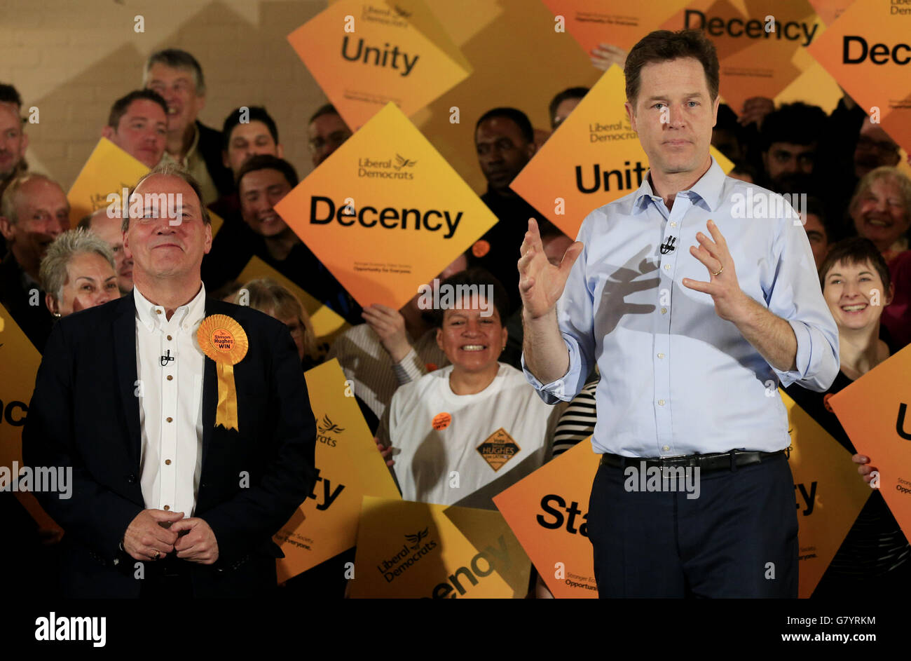 Liberal Democrat Party leader Nick Clegg speaks to supporters as parliamentary candidate for Bermondsey and Old Southwark Simon Hughes (left) looks on at the Rennie and Manor Estates Tenants Association Hall in Bermondsey, London. Stock Photo