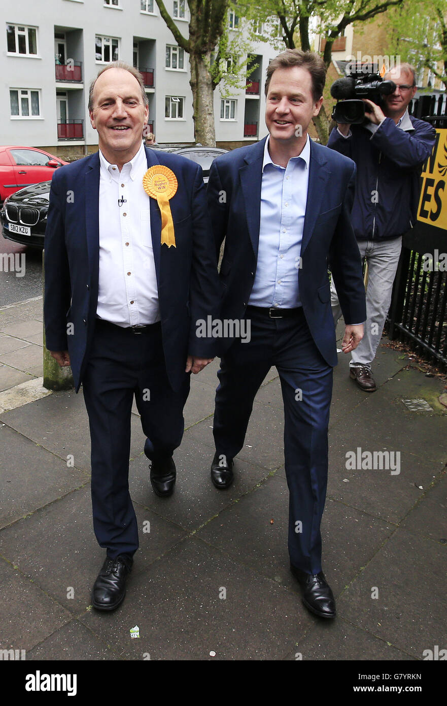 RETRANSMITTED CORRECTING LOCATION Liberal Democrat Party leader Nick Clegg with parliamentary candidate for Bermondsey and Old Southwark Simon Hughes (left) attend a campaign rally at Rennie and Manor Estates Tenants Association Hall, Bermondsey, London. Stock Photo