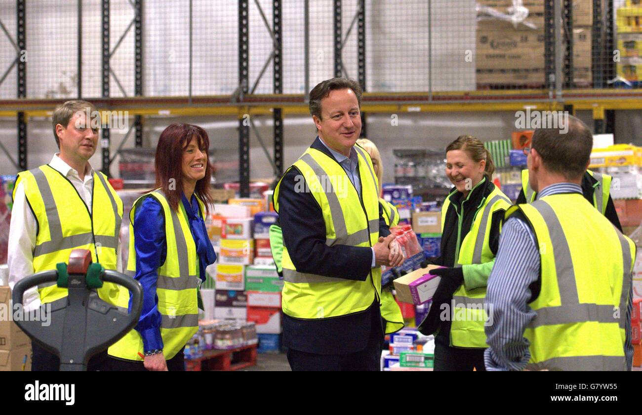 Prime Minister David Cameron meets distribution staff during a visit to