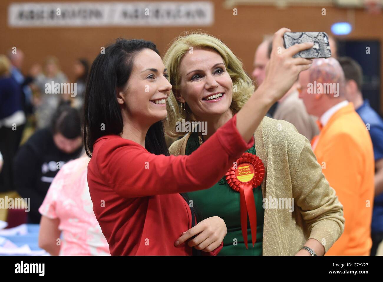Prime Minister of Denmark Helle Thorning-Schmidt (right) poses for a selfie as General Election votes are counted at Neath Sports Centre. Stock Photo