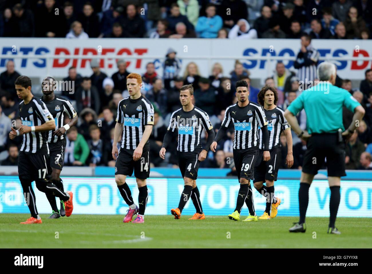 Newcastle United players after conceding the opening goal during the Barclays Premier League match at St James' Park, Newcastle. Stock Photo
