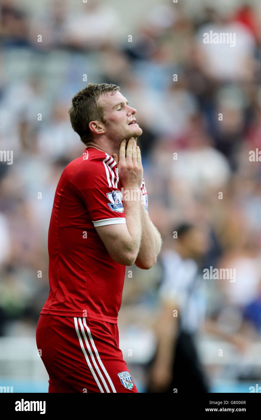 West Bromwich's Chris Brunt reacts after missing a chance during the Barclays Premier League match at St James' Park, Newcastle. Stock Photo