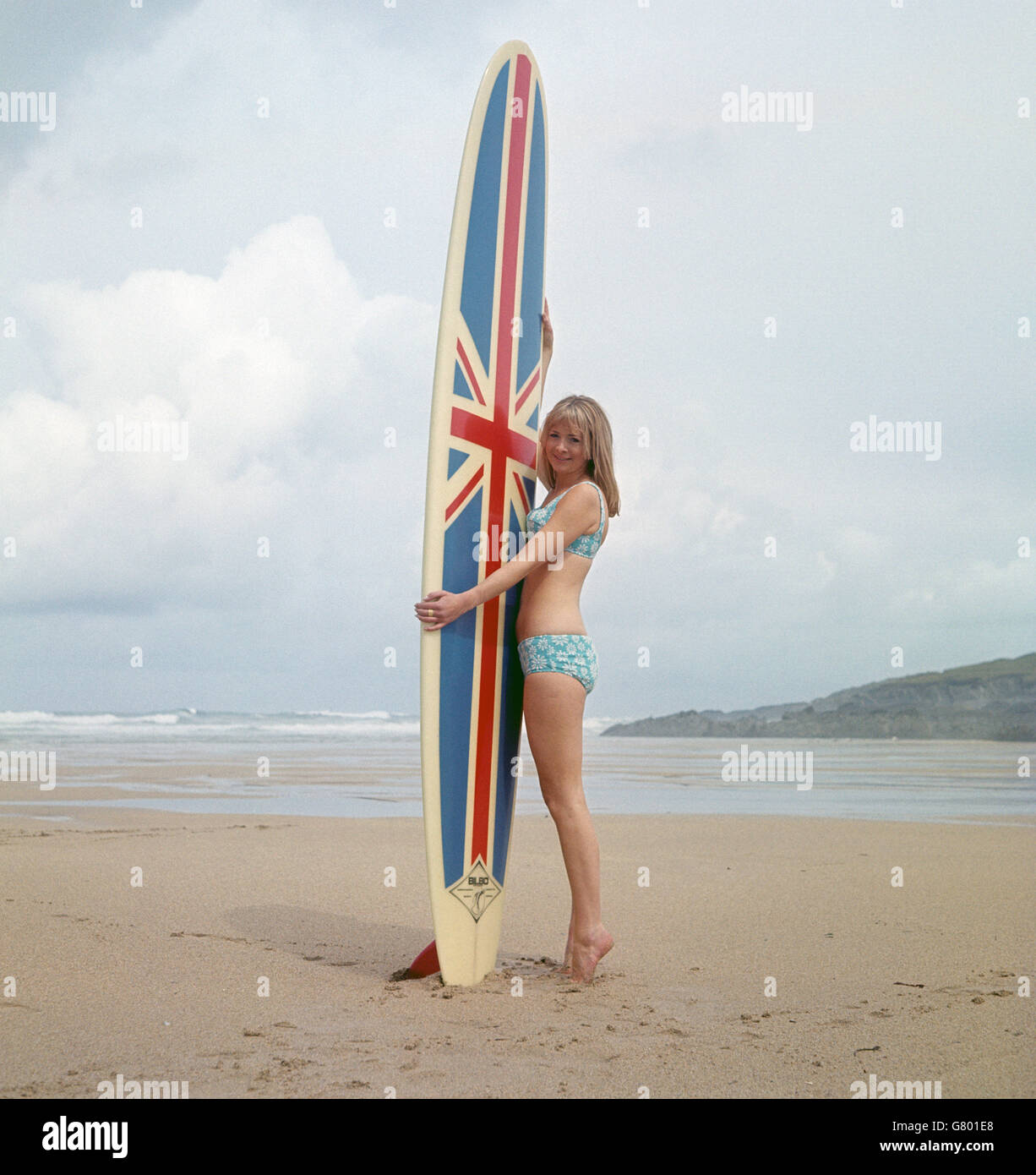 Surfing enthusiast Simone Renvoize, 22, of Newquay, at Fistral Beach in Cornwall. Stock Photo