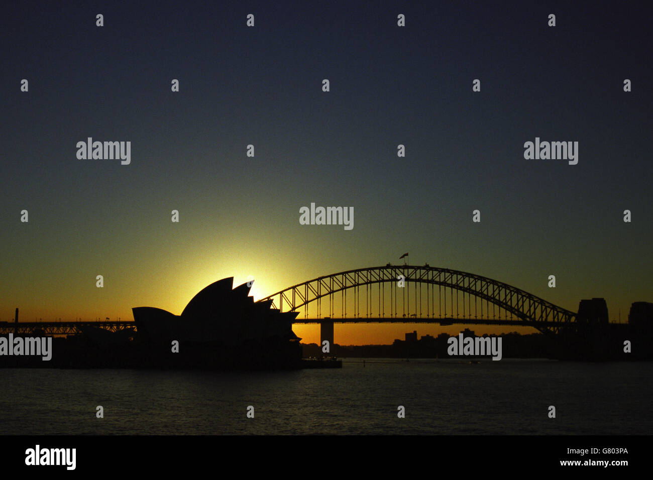 View of the Sydney Harbour Bridge and the Opera House at sunset Stock ...