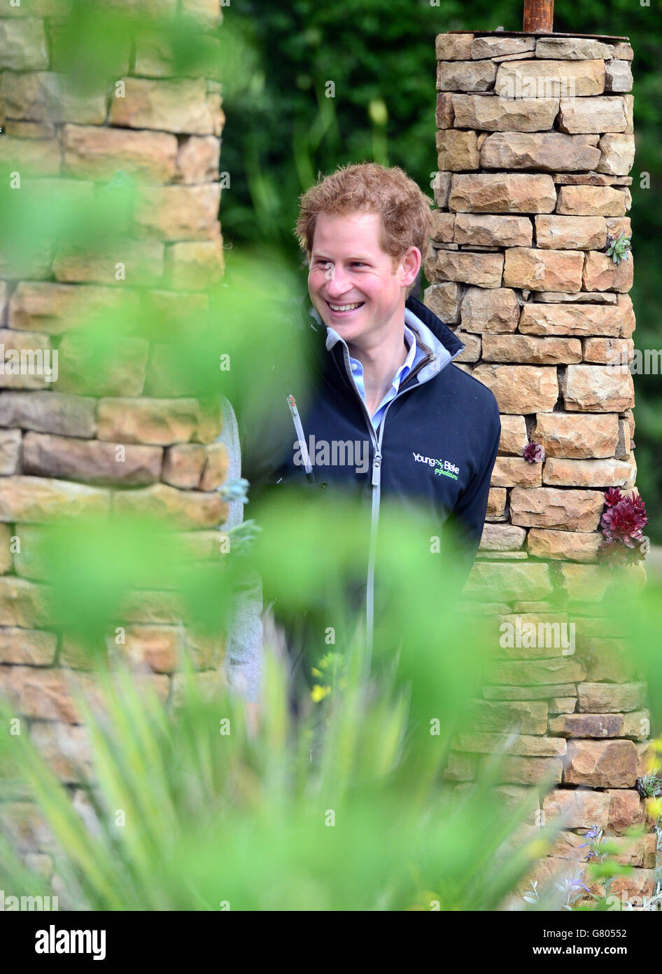 Prince Harry visits a southern African-themed garden at the 2015 RHS Chelsea Flower show created for Sentebale, a charity the Prince co-founded which helps poor children in the small kingdom of Lesotho. Stock Photo
