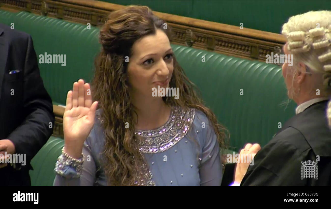 Tasmina Ahmed-Sheikh of the SNP being sworn in as the MP for Ochil & South Perthshire in the House of Commons, London, as she joined others in completing the swearing-in process ahead of next Wednesday's State Opening of Parliament. Stock Photo