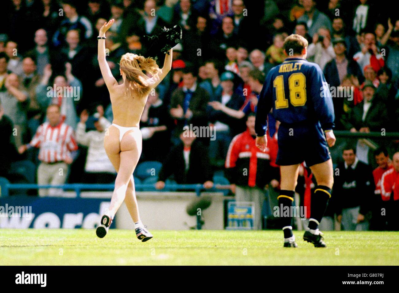 Neal Ardley, Wimbledon looks on as there is a streaker on the pitch Stock P...