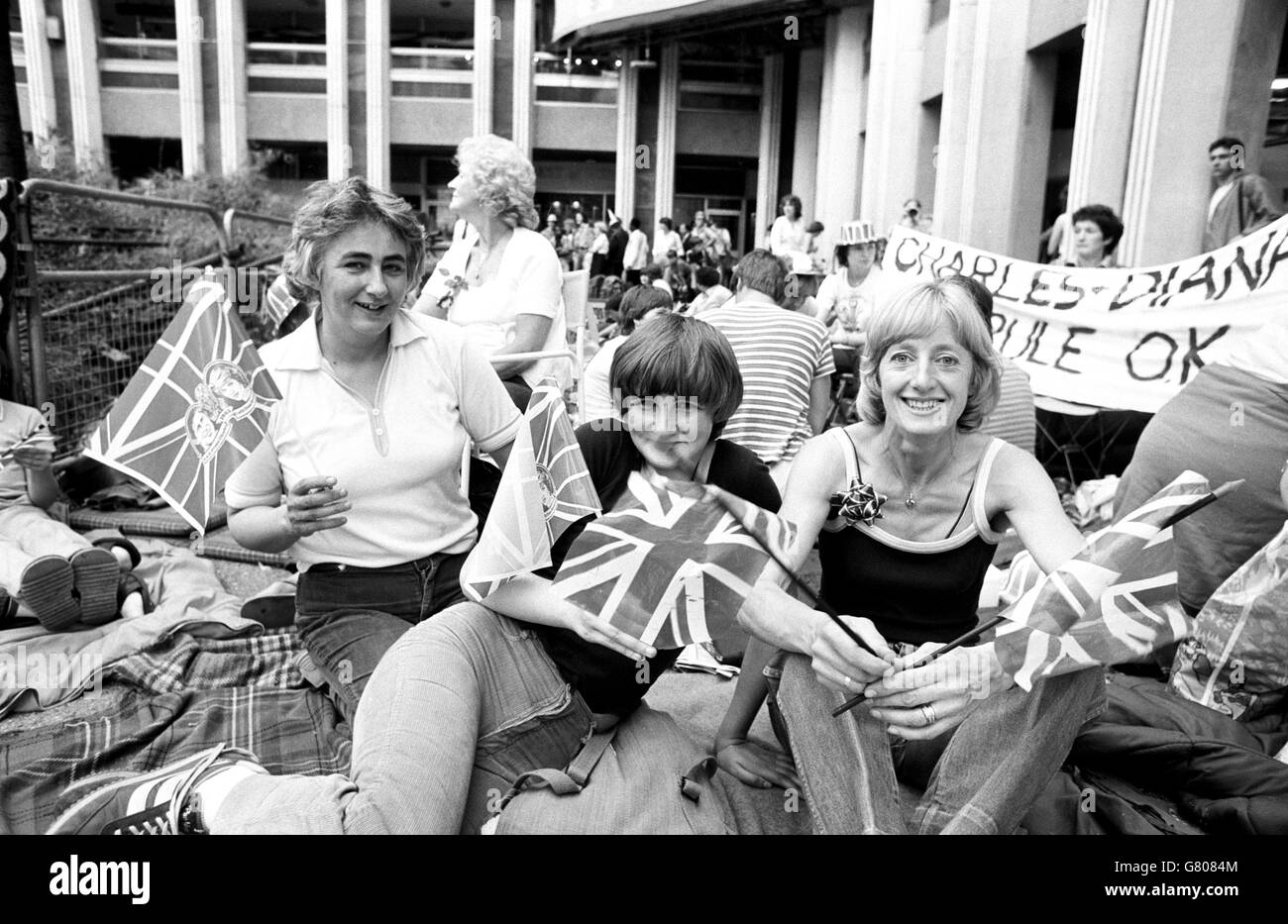(L-R) Joan Roddam, from Darras Hall, Newcastle Upon Tyne, her daughter Wendy, 15 and Joan Percy, from South Queensferry, West Lothian, stake out their position for the Royal Wedding outside St Paul's. Stock Photo