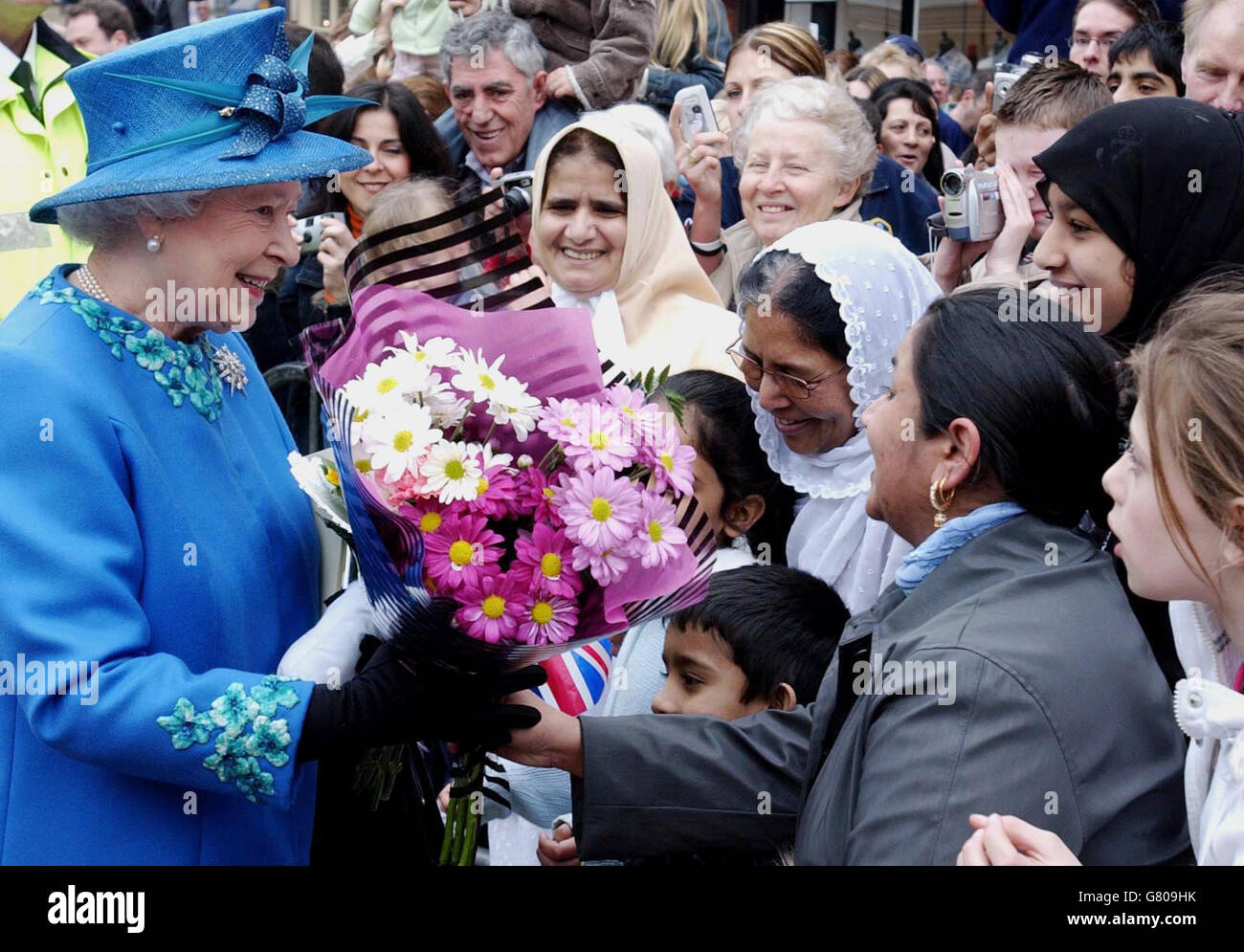 Britain's Queen Elizabeth II enjoys a walkabout in Wakefield city centre. Stock Photo