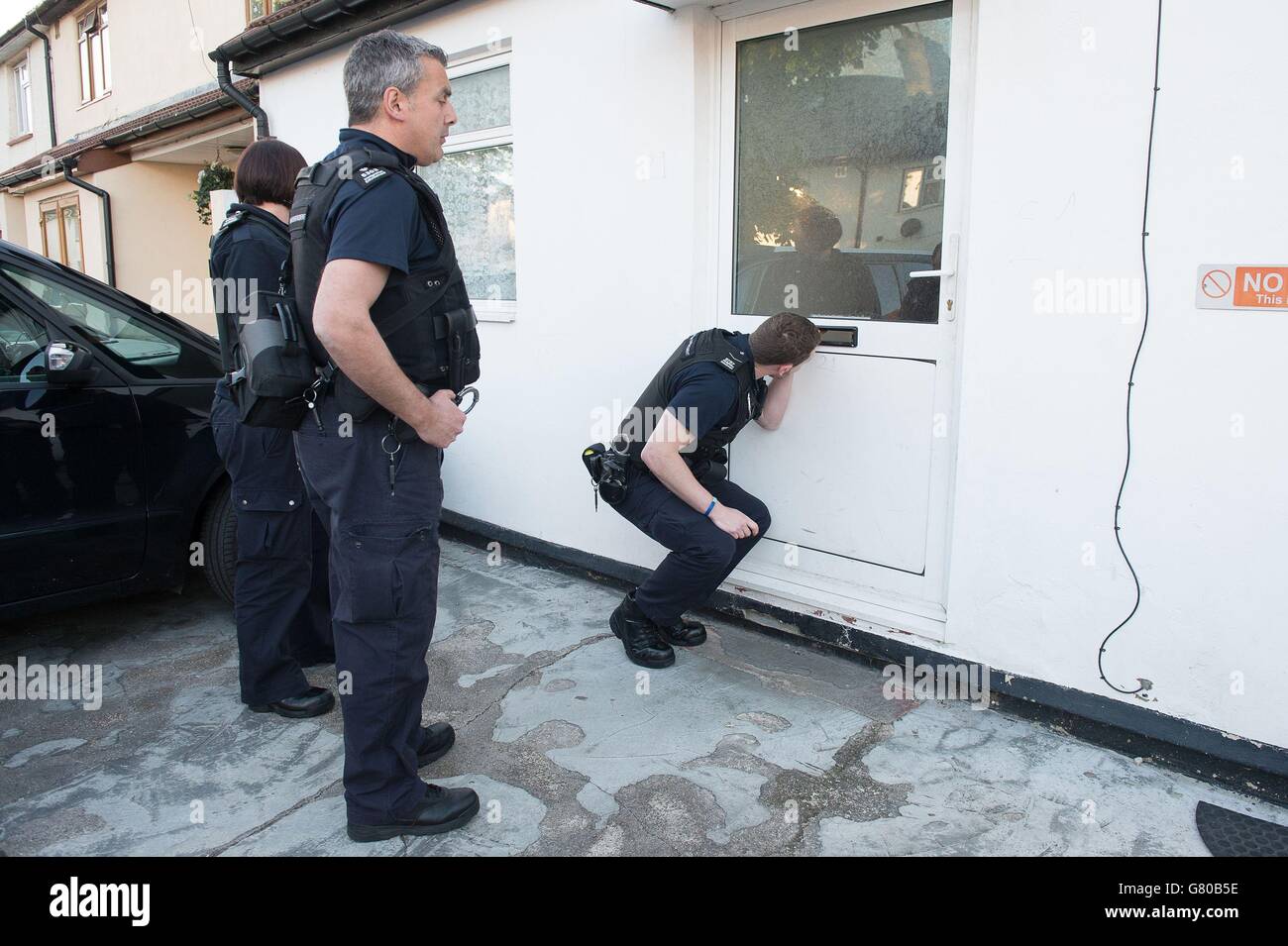 Immigration Enforcement officers raid a residential property looking ...