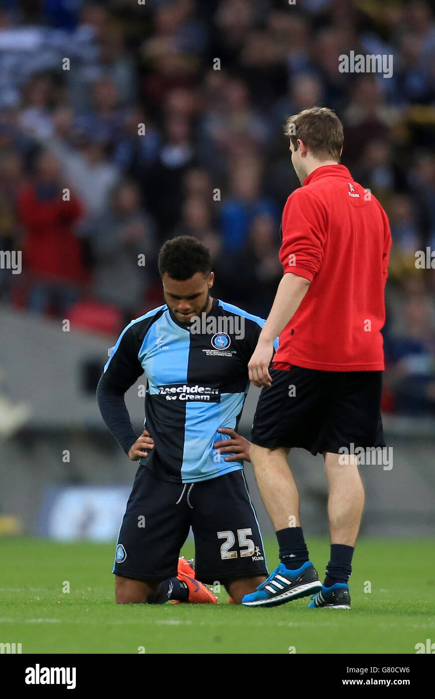 Wycombe Wanderers' Aaron Amadi-Holloway is left dejected after the Sky Bet League Two Play Off Final at Wembley Stadium, London. PRESS ASSOCIATION Photo. Picture date: Saturday May 23, 2015. See PA story SOCCER League Two. Photo credit should read: Nick Potts/PA Wire. Stock Photo
