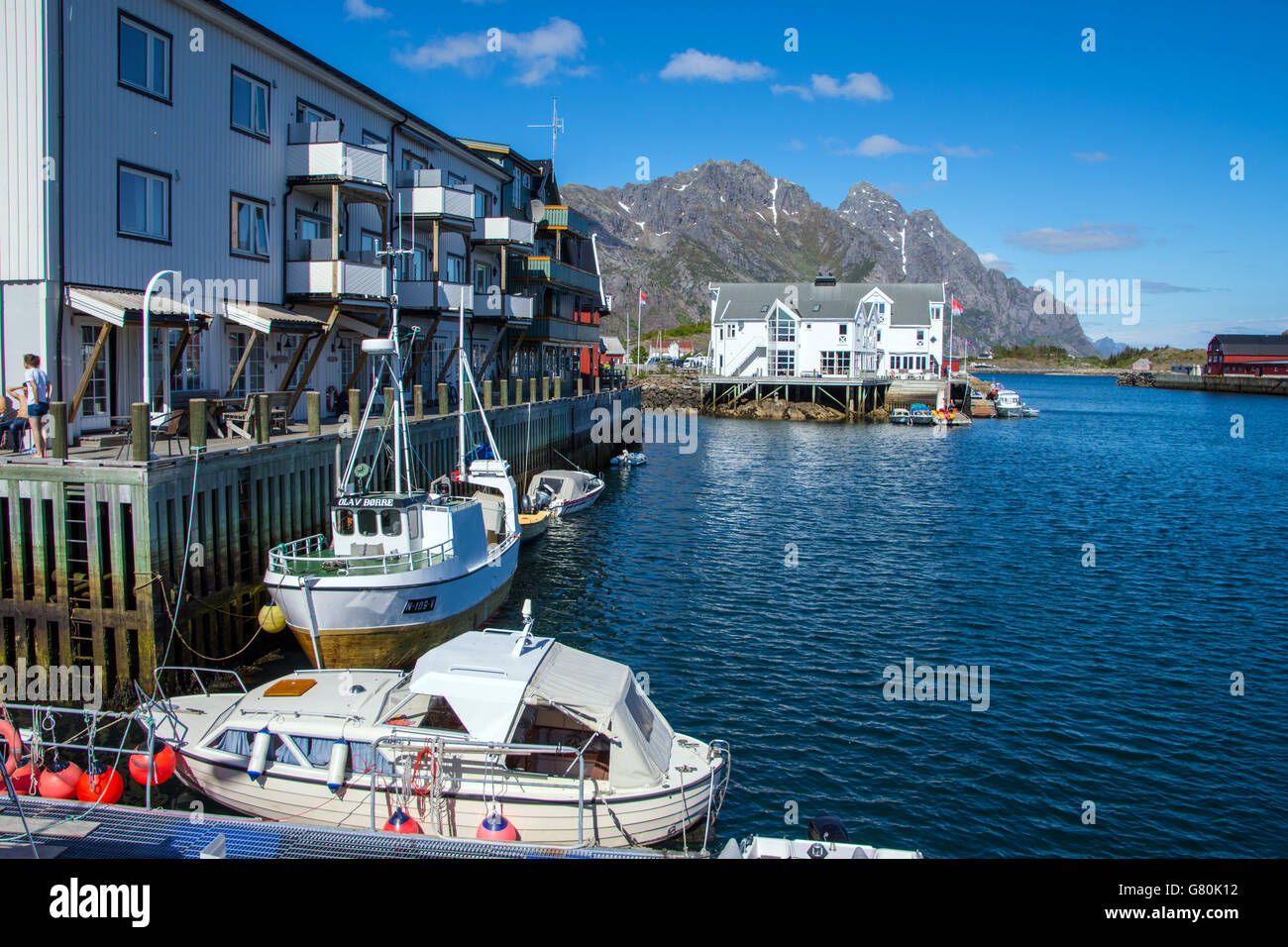 White buildings and boats, Henningsvaer, Lofoten, Nordland, Norway Stock Photo
