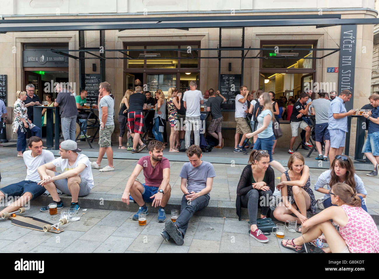 People outside the bar 'Vycep Na stojaka', Jakub square, Brno bar sidewalk Stock Photo