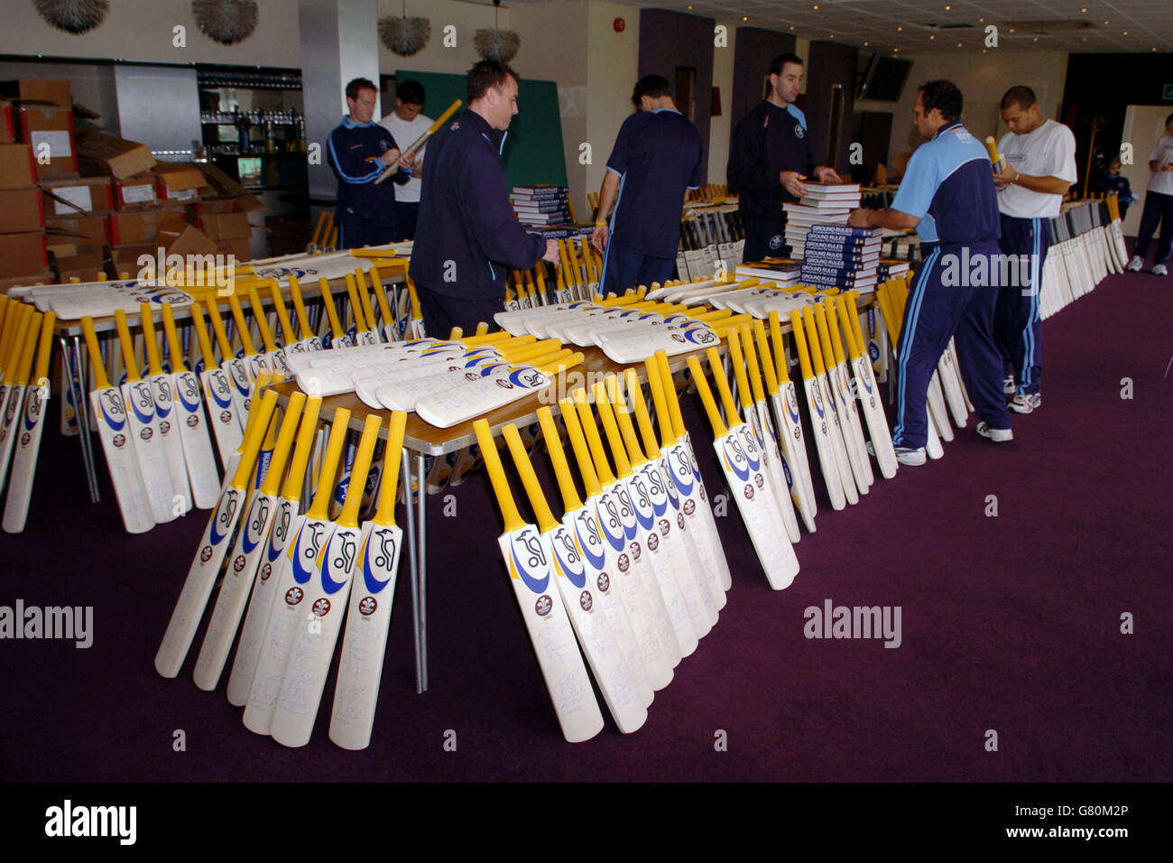 Cricket - Surrey County Cricket Club - Press Day - The Brit Oval. Surrey players sign bats during the Press day Stock Photo