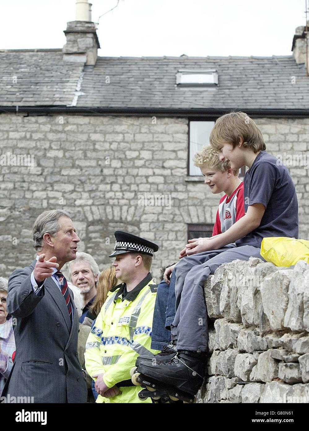 The Prince of Wales chats with children as he opened a new restaurant and shop using locally sourced produce at Booths Supermarket. Stock Photo