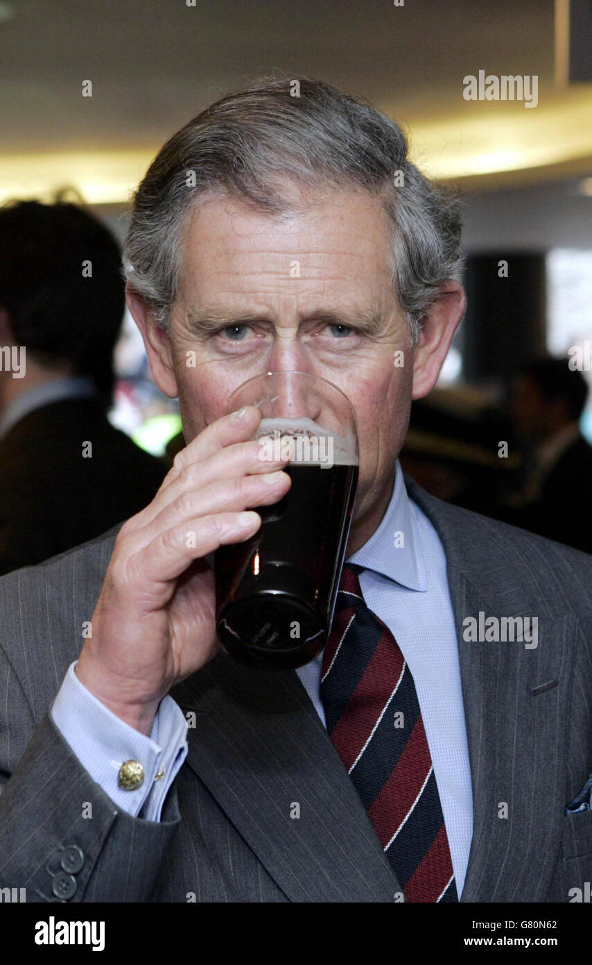 The Prince of Wales enjoys a locally brewed beer as he opened a new restaurant and shop using locally sourced produce at Booths Supermarket. Stock Photo