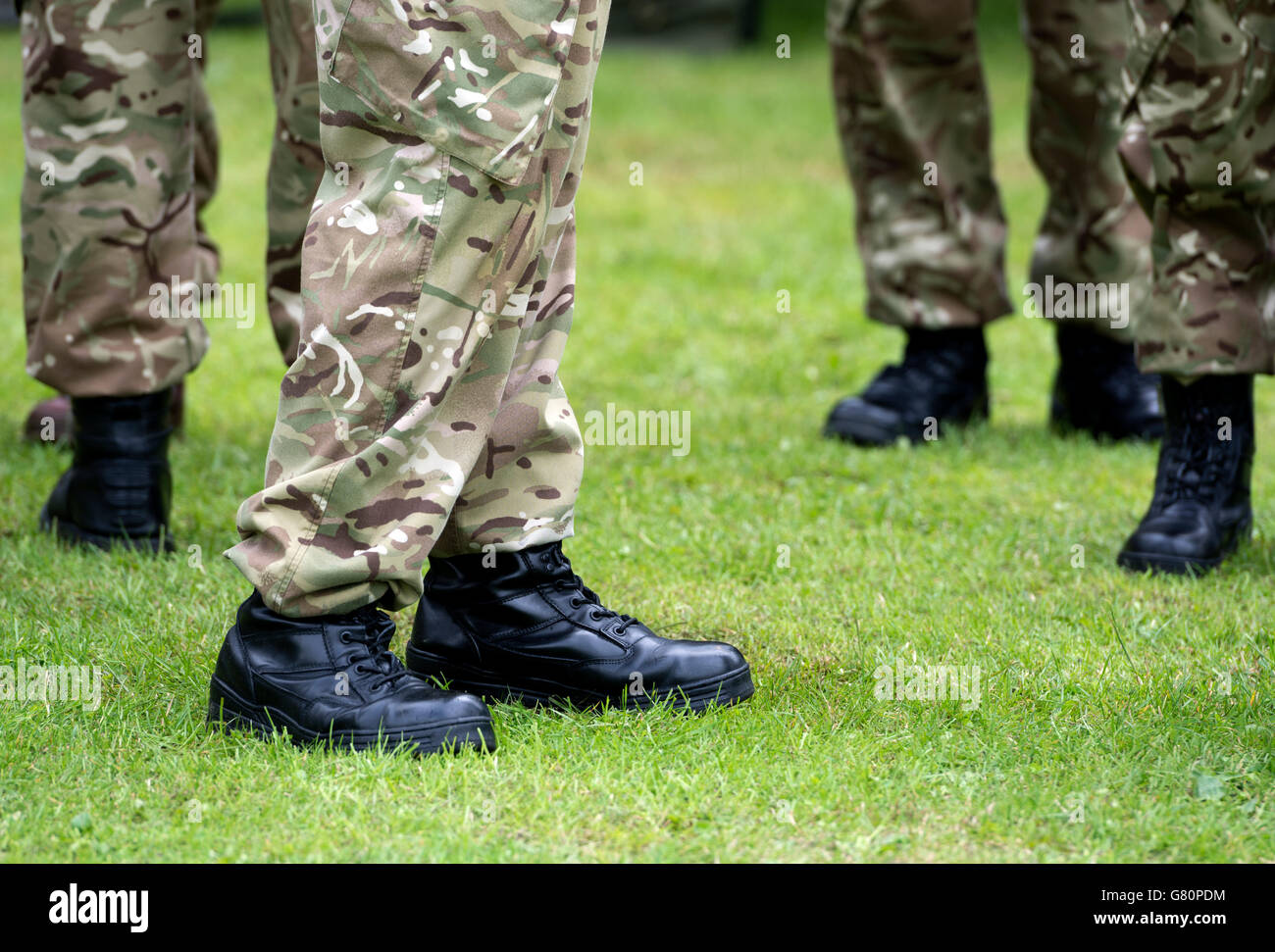 Army cadets with black boots and camouflage pattern trousers, UK Stock ...