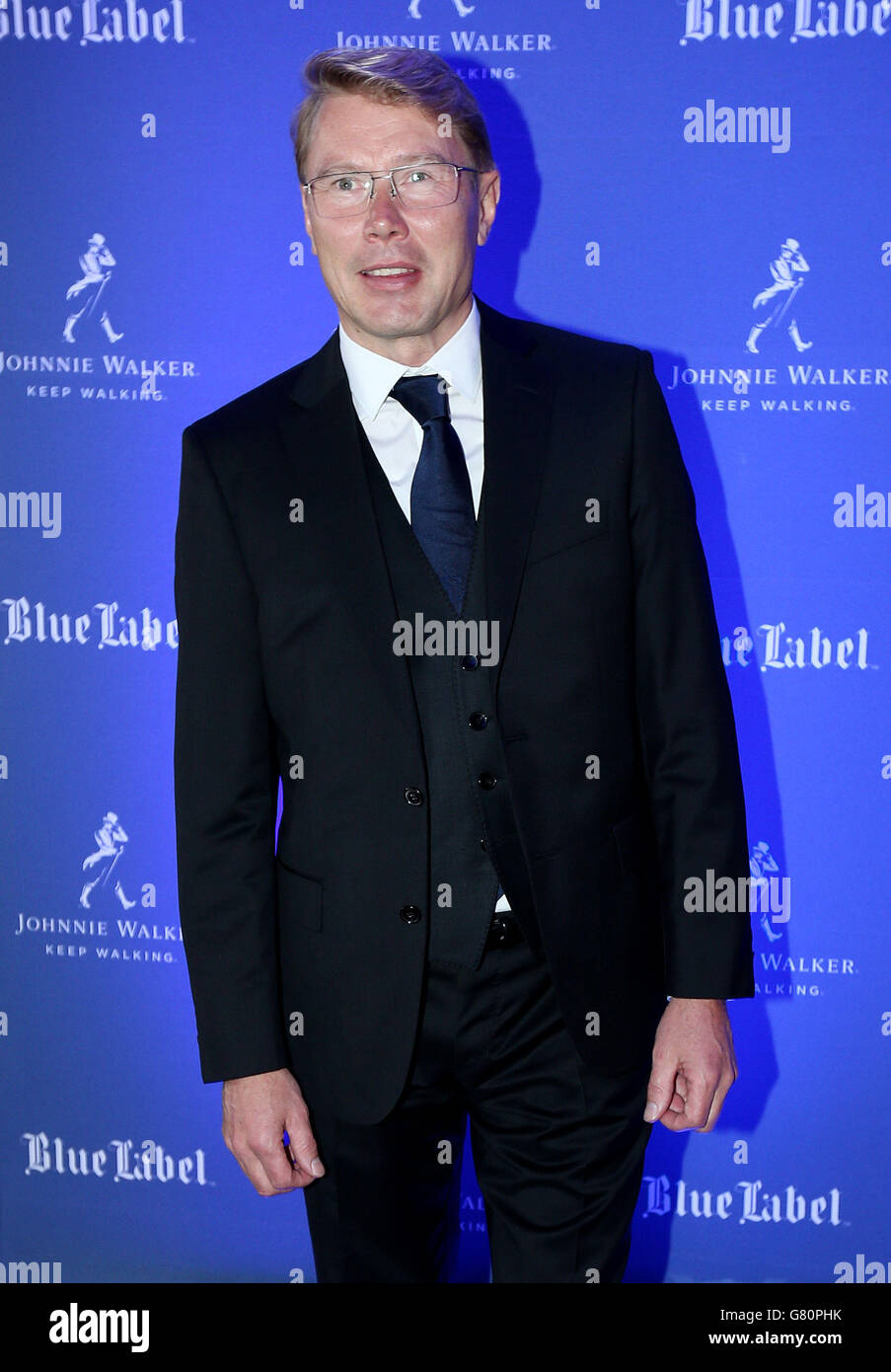 Two-time World Champion and Johnnie Walker Responsible Drinking Ambassador Mika Hakkinen arrives at Symphony in Blue, hosted by Johnnie Walker Blue Label, in Monaco. Stock Photo